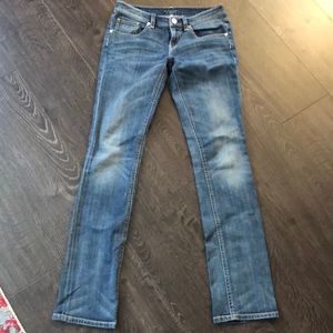 Elite Tahari straight legged jeans.